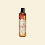 Bottle of Intimate Earth Naughty peaches peach flavoured lubricant