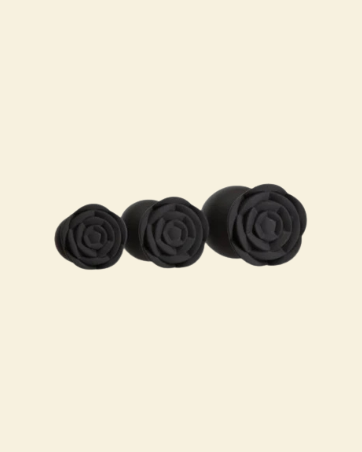 Three rose shaped bases of black silicone buttplugs