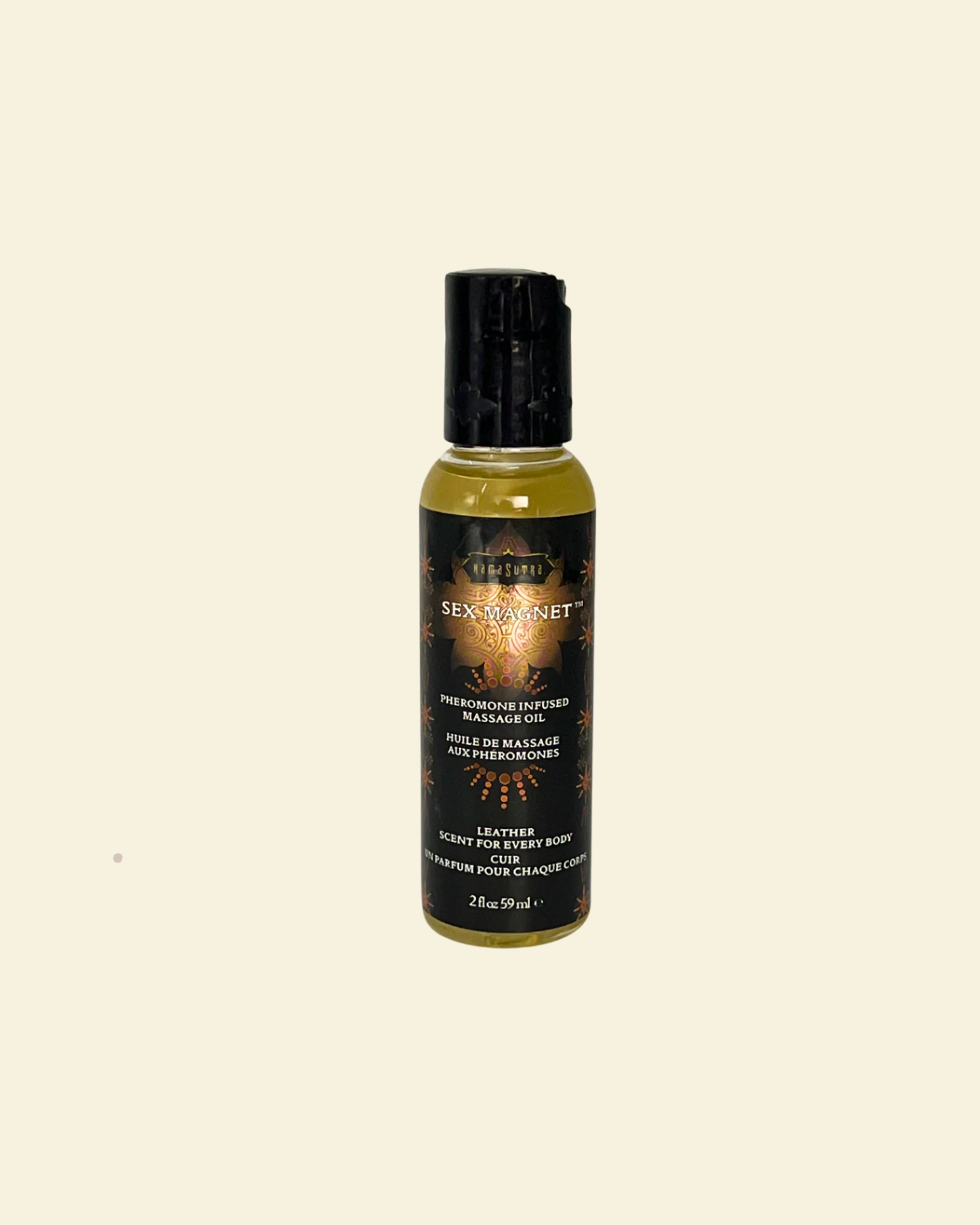 Bottle of Sex Magnet Massage Oil on a beige background