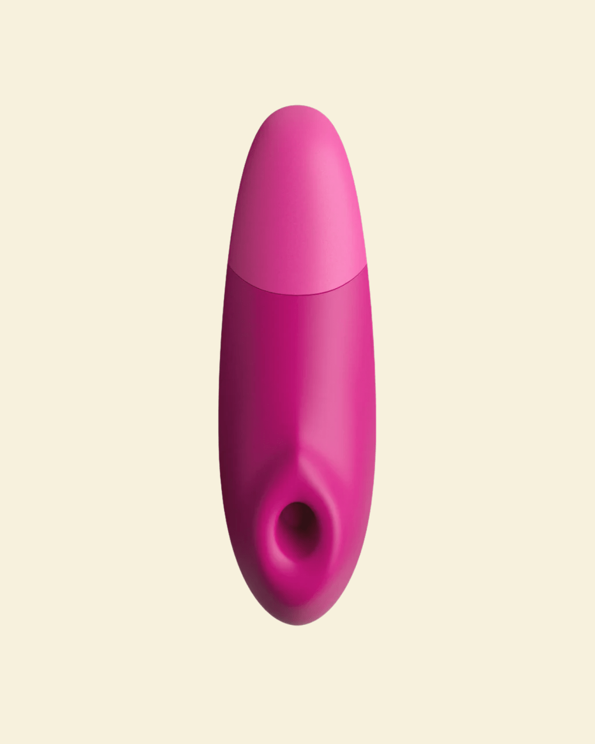 Pink Womanizer Enhance on a beige background - High Tide