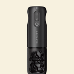 A sleek matte black rotating masturbator showing what the inside of the sleeve looks like. 