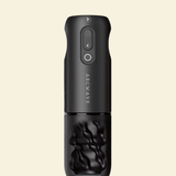 A sleek matte black rotating masturbator showing what the inside of the sleeve looks like. 