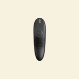 A black personal massager shown from the front against a solid cream-colored background.