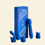 Blue silicone wand vibrator with packaging on a beige background
