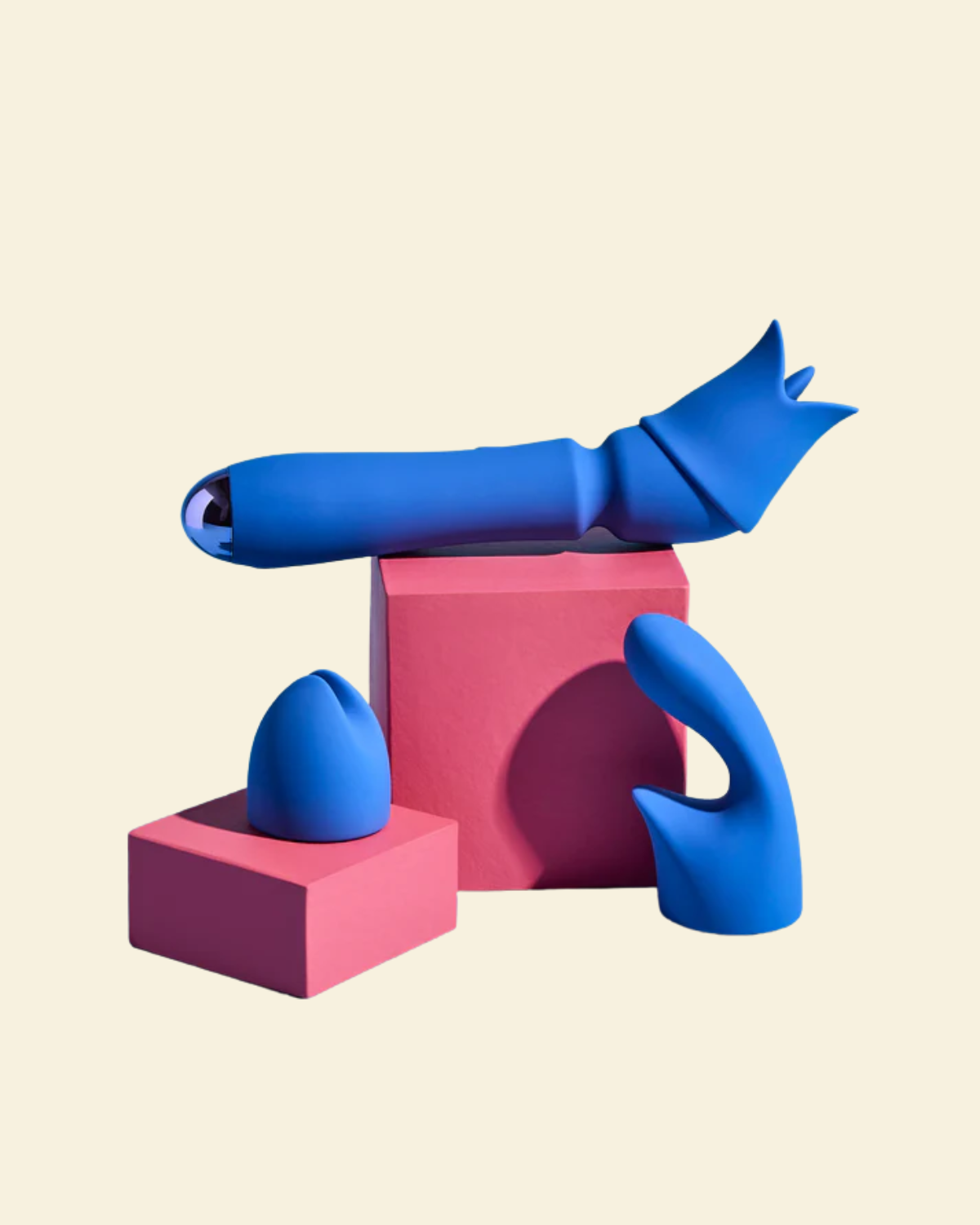 Blue wand and attachments on pink block on beige background