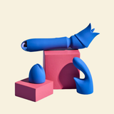 Blue wand and attachments on pink block on beige background