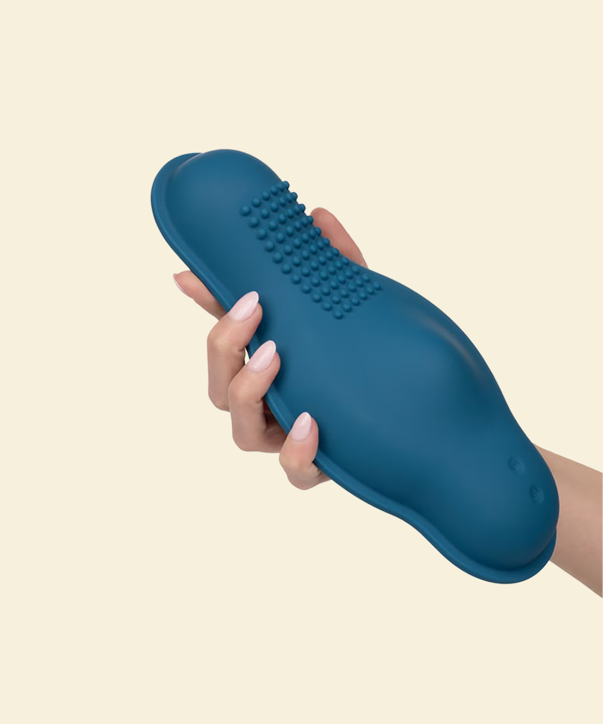 Hand holding a blue silicone vibrator 