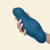 Hand holding a blue silicone vibrator 