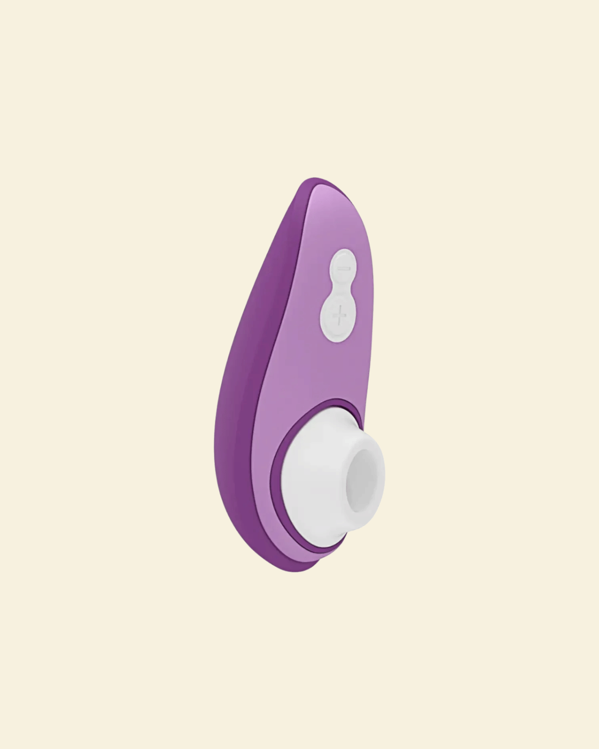 Purple Womanizer Air suction toy on beige background