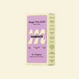 Box of Moments Mega Thin 0.03 condoms on a light beige background