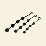 3 black anal beads in varying sizes