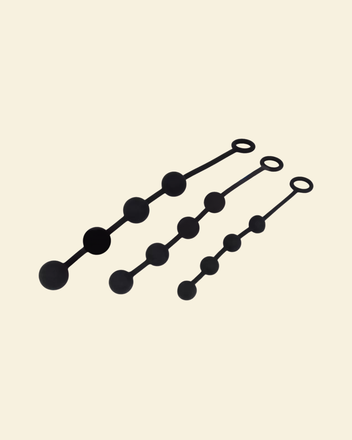 3 black anal beads in varying sizes