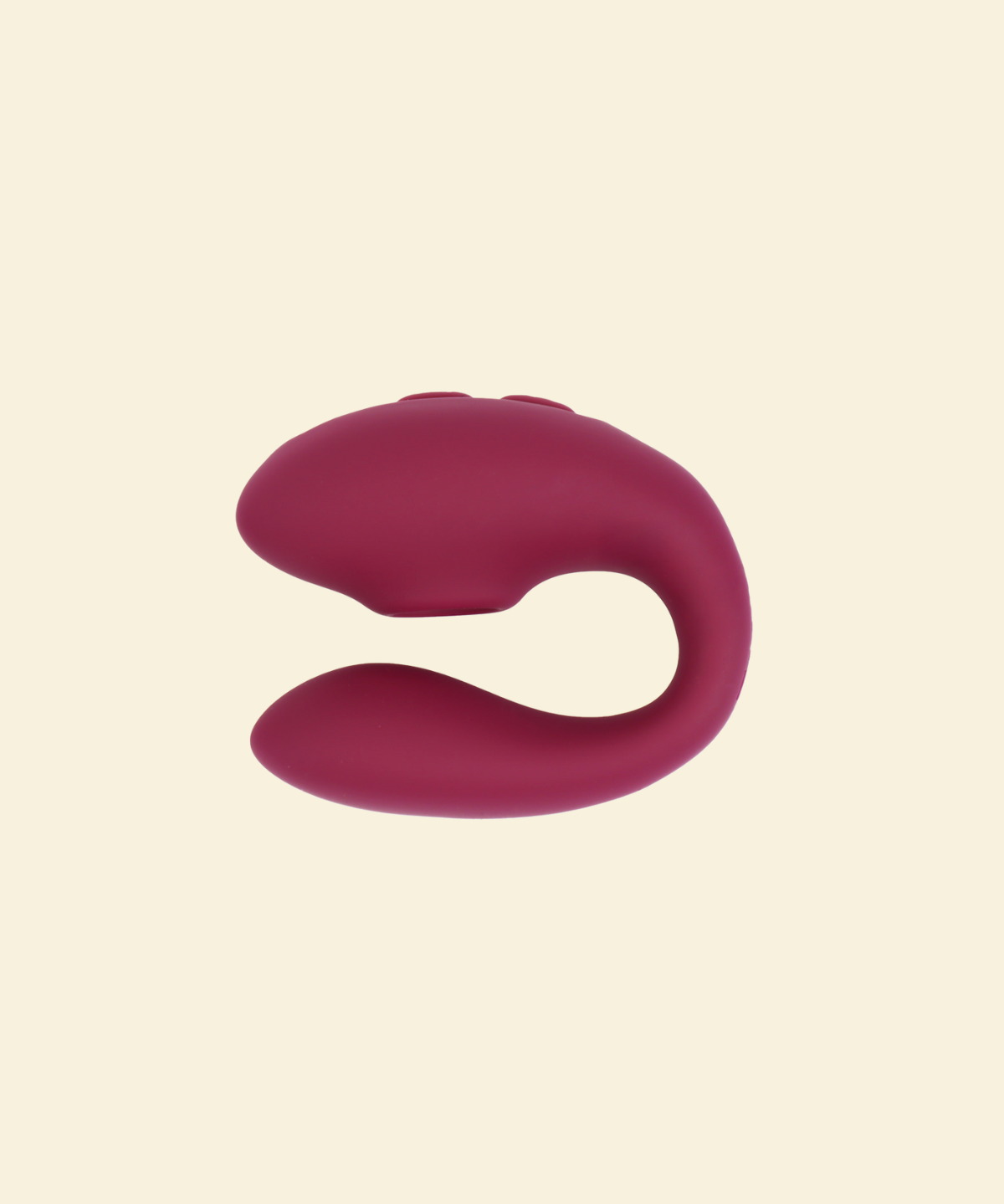 Plum colored blended stimulation vibrator on a beige background