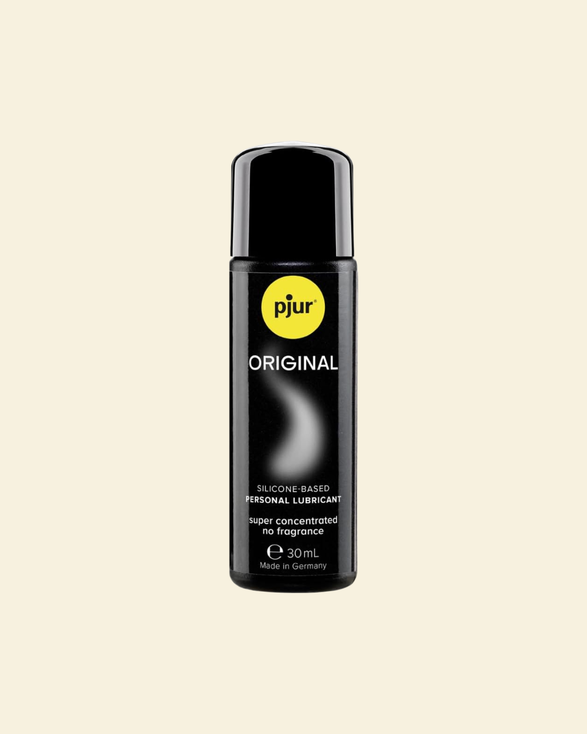Black bottle of pjur Original lubricant on a beige background