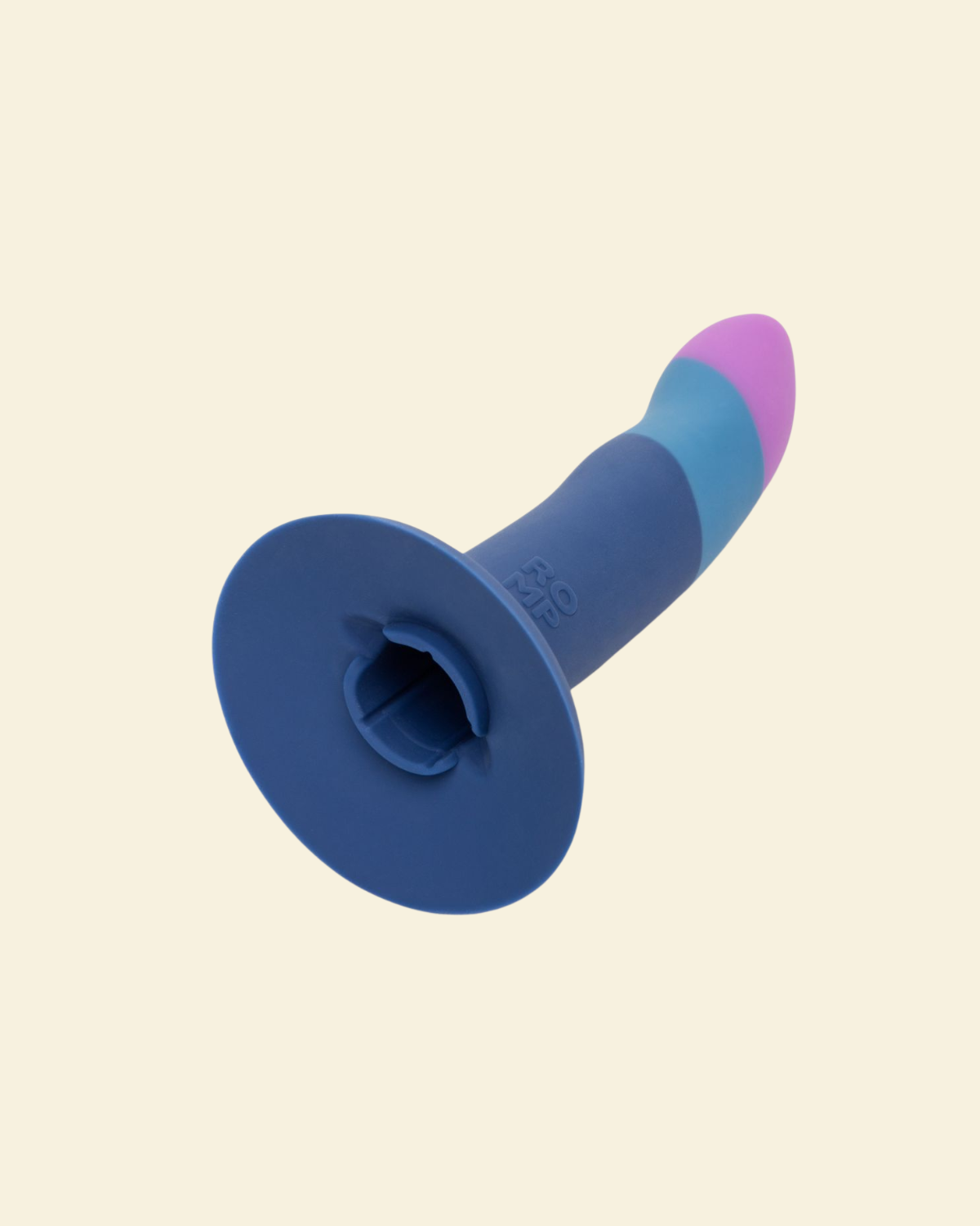 Blue and purple silicone dildo on a beige background