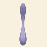 A single lavender-purple personal massager with a sleek, curved ergonomic design, shown vertically against a solid pale cream background.