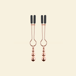 Two rose gold nipple clamps