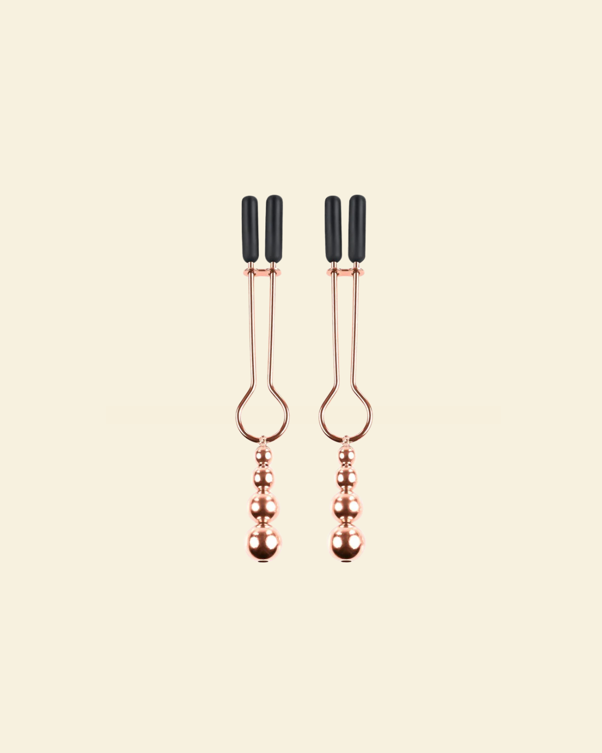 Two rose gold nipple clamps
