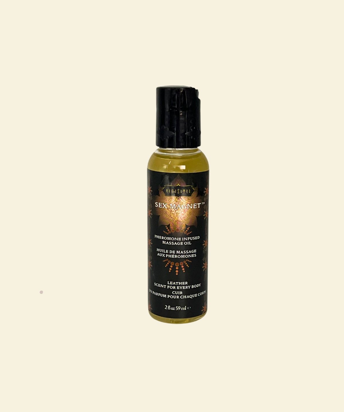 Bottle of Sex Magnet Massage Oil on a beige background