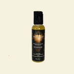 Bottle of Sex Magnet Massage Oil on a beige background