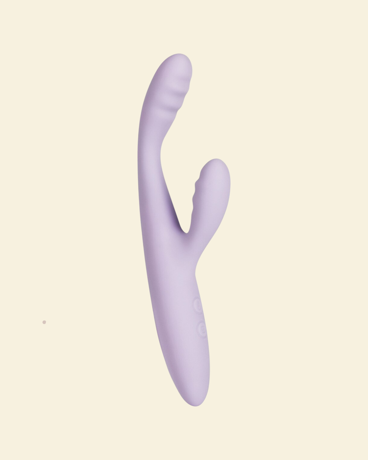 Lilac coloured rabbit vibrator on a beige background