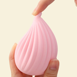 Pink shell like soft touch palm vibrator