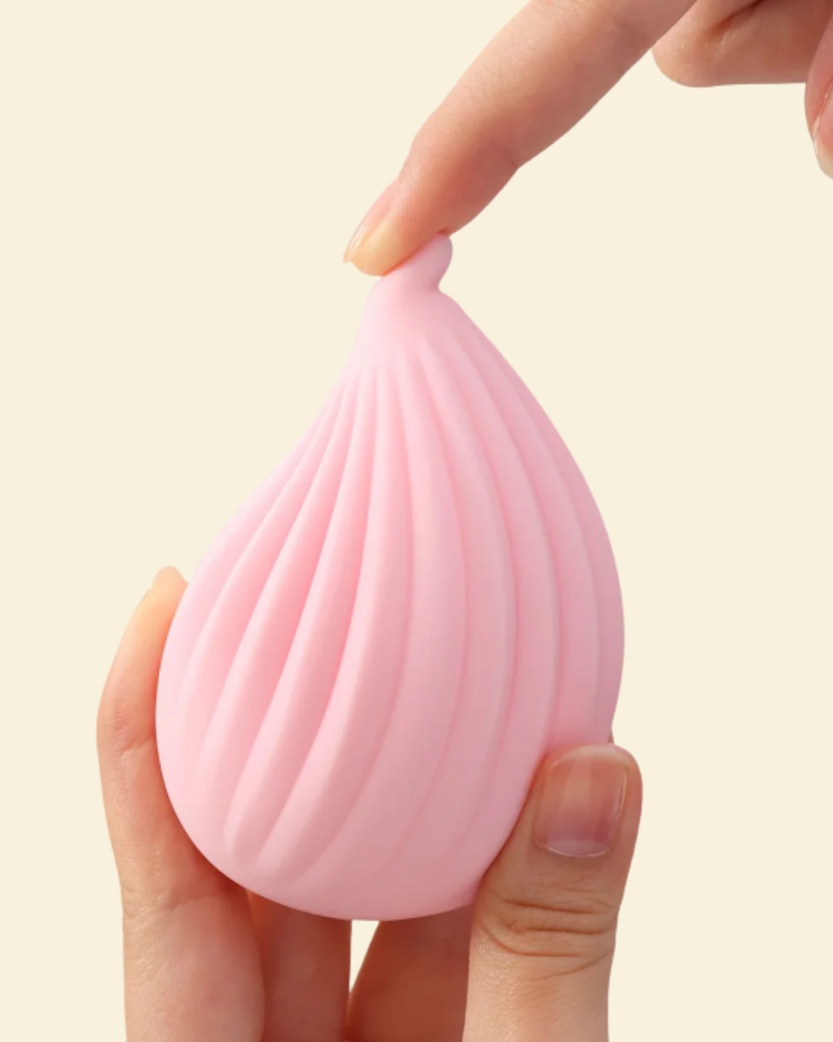 Pink shell like soft touch palm vibrator