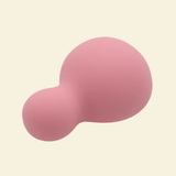 a small pink and soft palm vibrator on a beige background