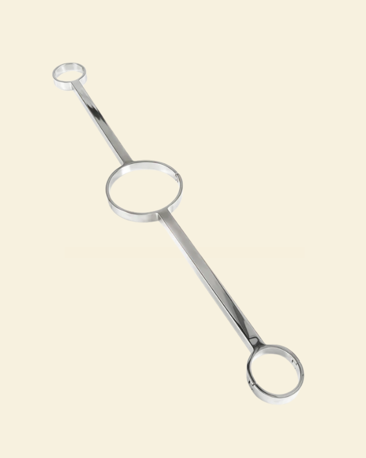 Stainless Steel neck to wrist spreader bar on a beige background