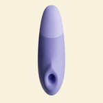 a blue Womanizer Enhance suction and vibrating toy - High Tide