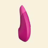 pink Womanizer Enhance on a beige background from High Tide in Melbourne