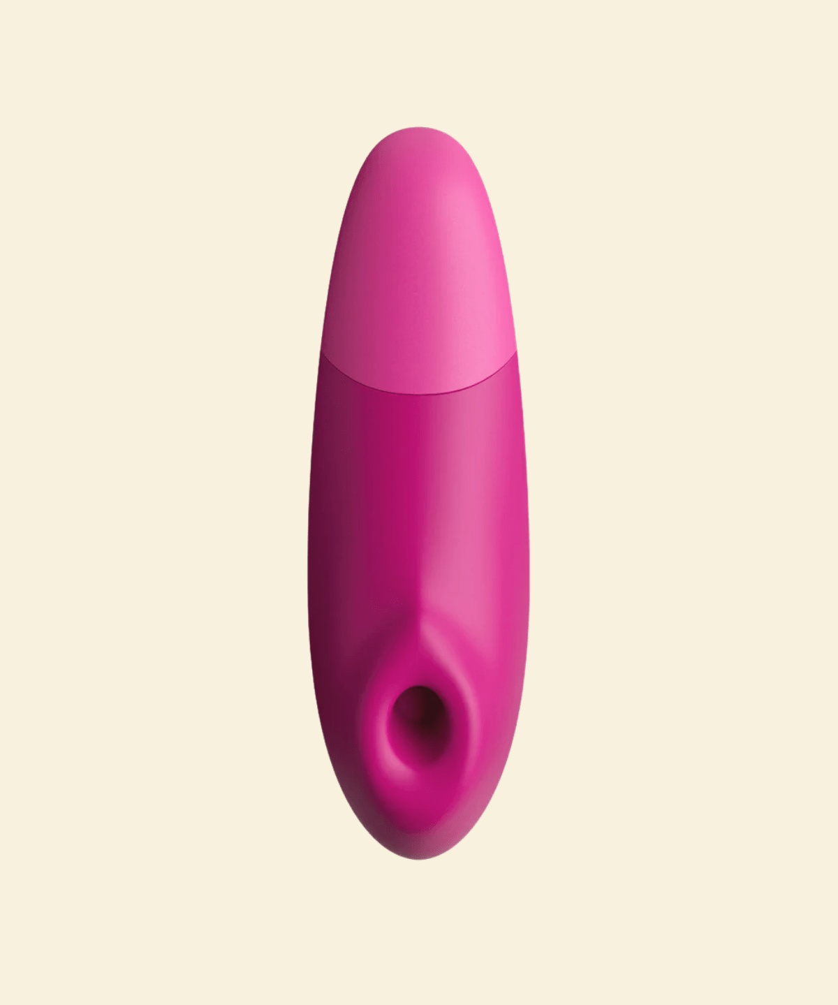 Pink Womanizer Enhance on a beige background - High Tide
