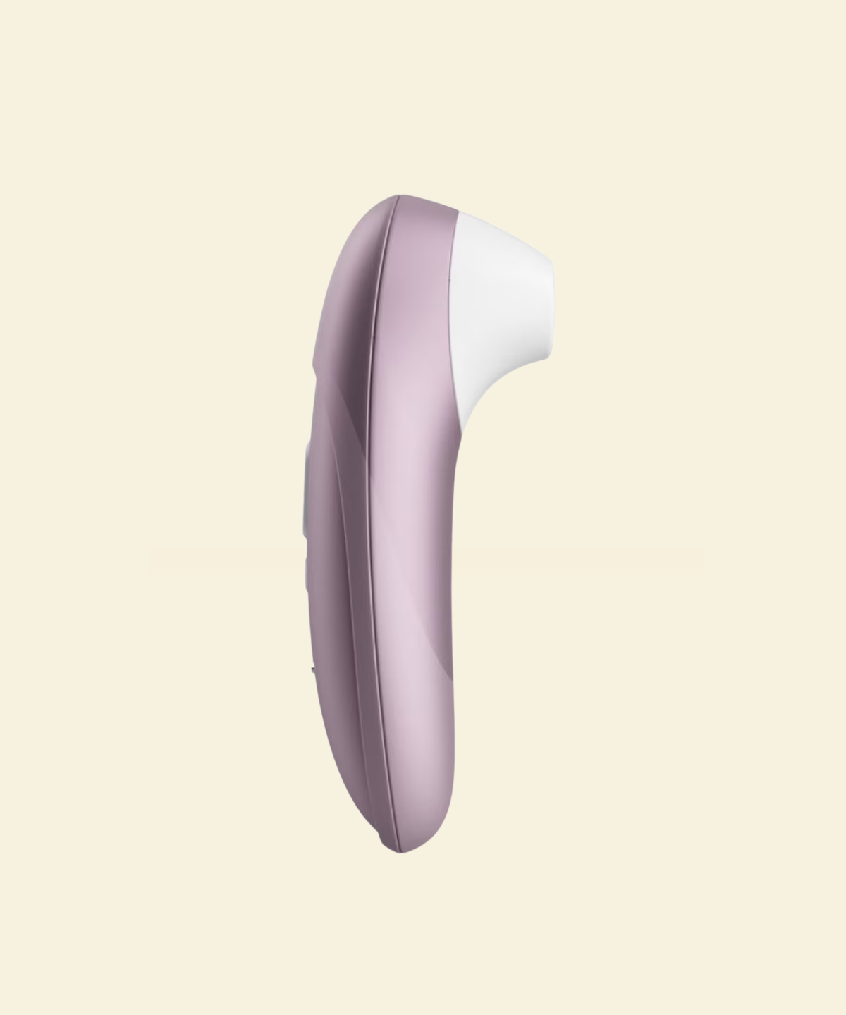 Womanizer Pro on beige background