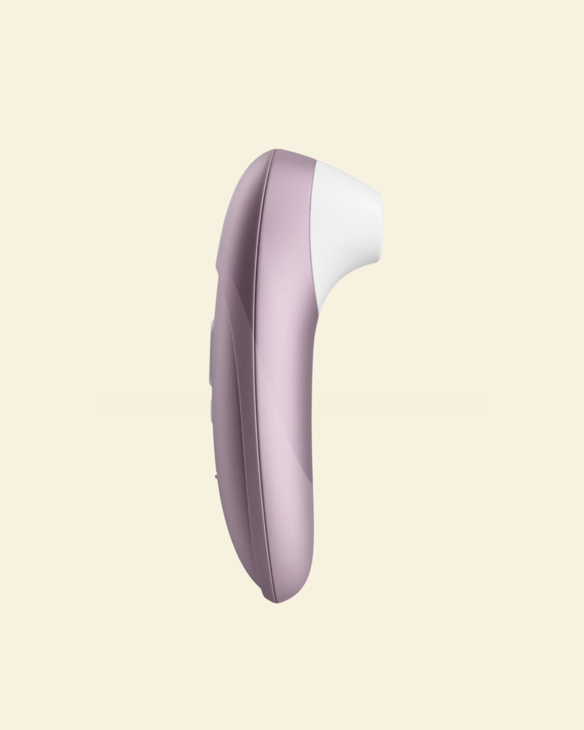 Womanizer Pro on beige background