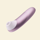 Womanizer Pro on a beige background