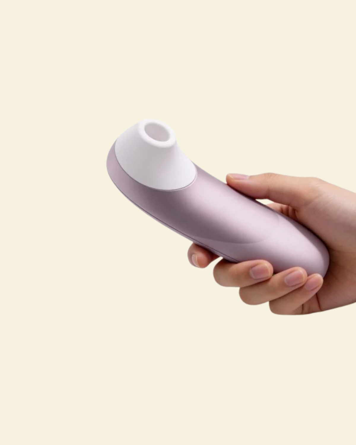 hand holding and showcasing the front of the Womanizer Pro