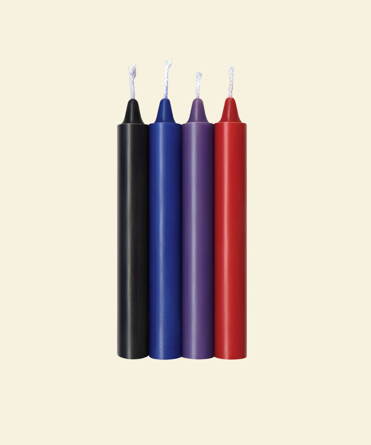 Four colorful drip candles on a beige background